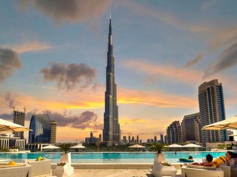 Burj Khalifa against a golden sunset sky